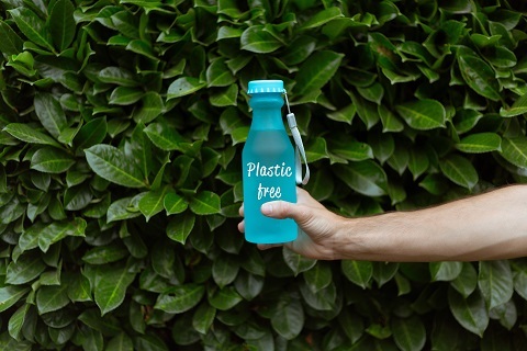Person Holding Blue Water Bottle_web.jpg
